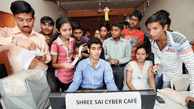 Students crowded at Shree Sai Cyber Café waiting for exam form filling services